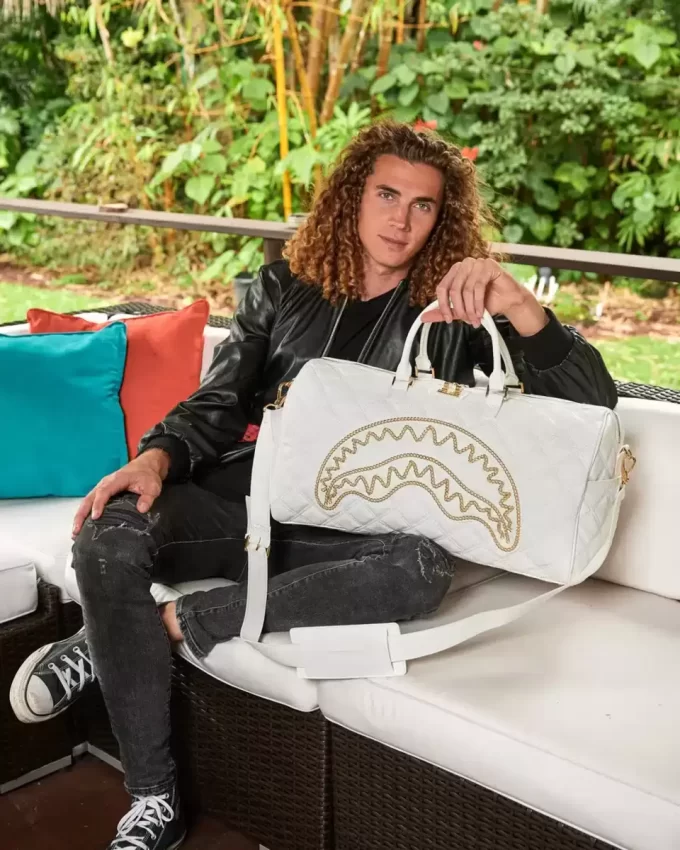 RIVIERA LE BLANC GOLD CHAIN SHARK DUFFLE RIVIERA LE BLANC GOLD CHAIN SHARK DUFFLE