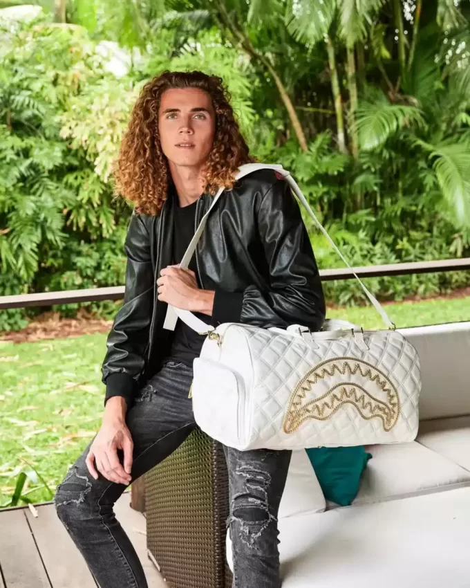 RIVIERA LE BLANC GOLD CHAIN SHARK DUFFLE RIVIERA LE BLANC GOLD CHAIN SHARK DUFFLE
