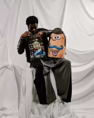 Rucsac Mr. Potato Head cu etichetă velcro și design mixt, model DLXSV